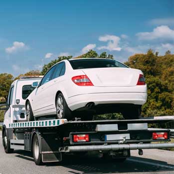 sérült gépkocsi szállítás